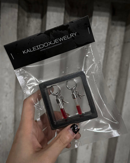 K logo & Blood tube earrings